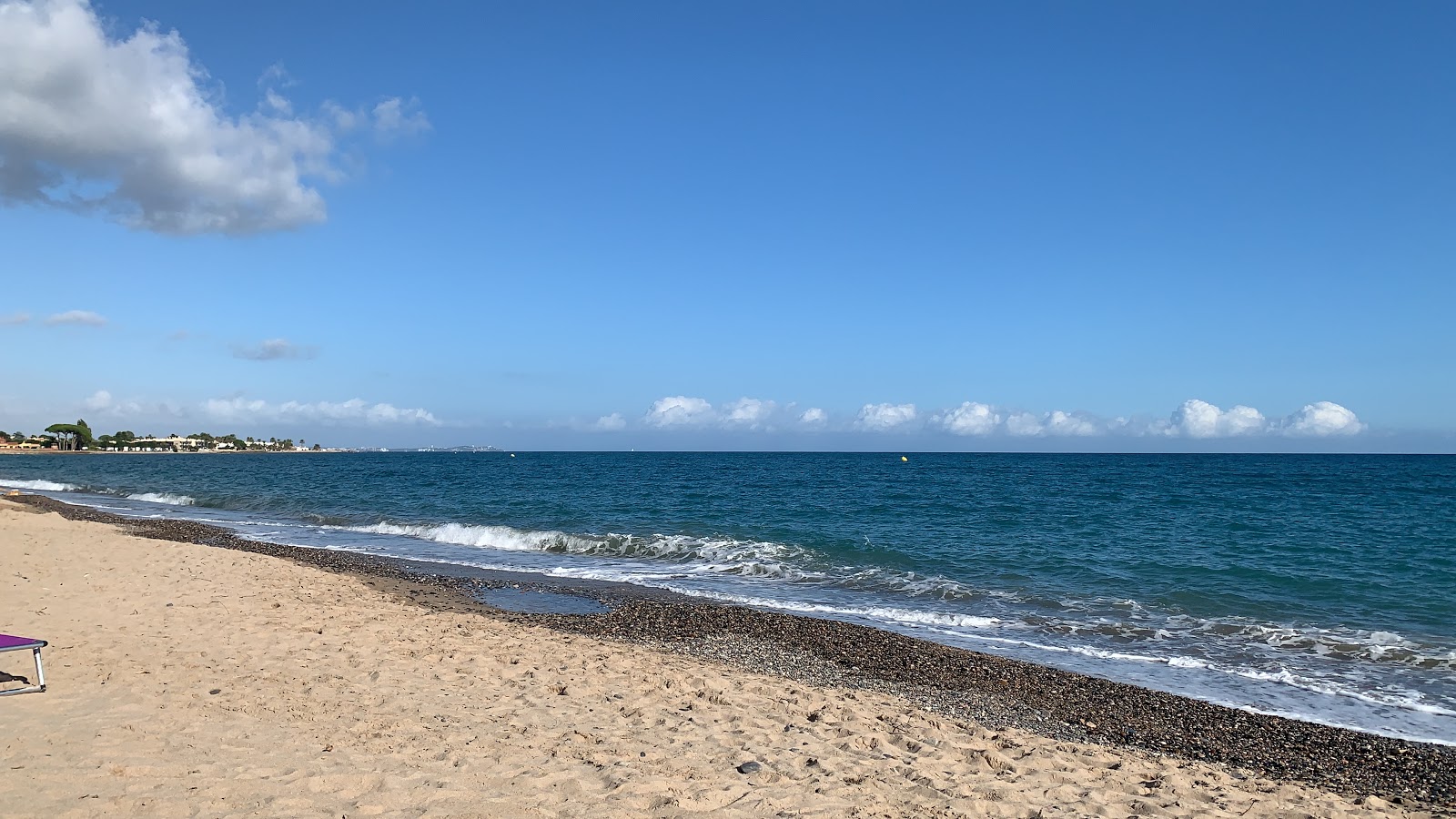 Photo de Playa de Rifa avec l'eau turquoise de surface