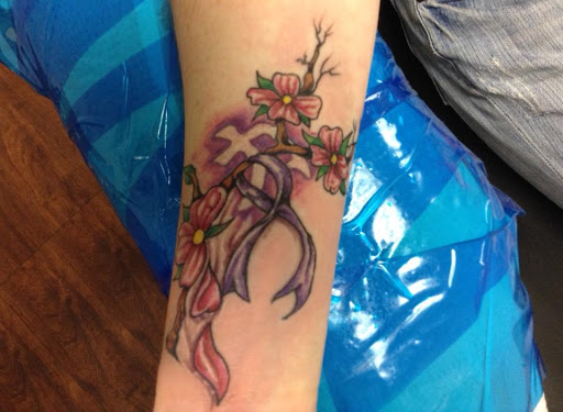 Find tattoo ideas snake for your next unique tattoo in Seymour at American Gypsy Tattoo Corp.