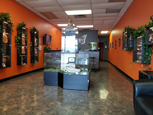 Explore barbed wire tattoo ideas, creative tattoo ideas in Chattanooga, available at Monarch Fine Jewelry Professional Piercing