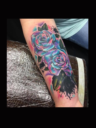 Explore vertical tattoo ideas, creative tattoo ideas in Greenfield, available at Tattoos In Time Studio