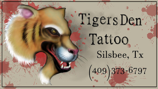 Explore red bird tattoo ideas, creative tattoo ideas in Silsbee, available at Tigers Den Tattoo Parlor