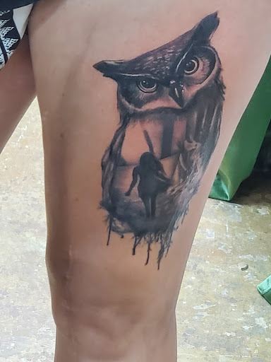 Explore cover up lower back tattoo ideas, creative tattoo ideas in Geneva, available at Famous Street Tattoo Geneva