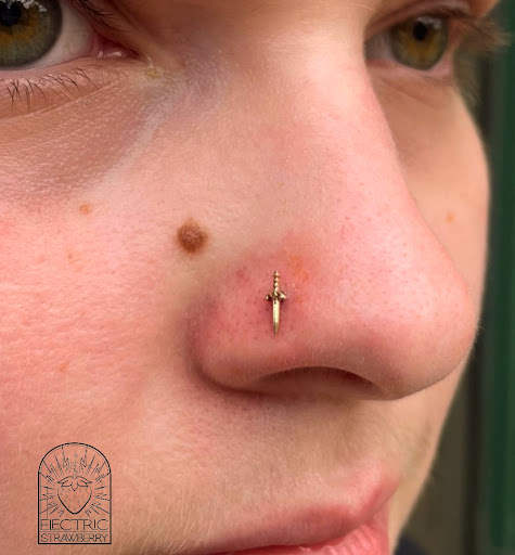 Explore viking head tattoo ideas, creative tattoo ideas in Saint Paul, available at Electric Strawberry Piercing