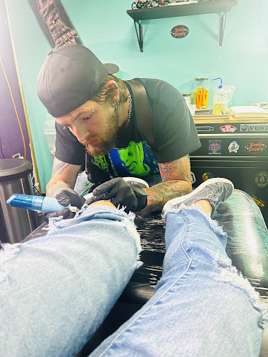 Explore ouroboros tattoo ideas, creative tattoo ideas in Mobile, available at Boujie Tattoo & Body Piercing