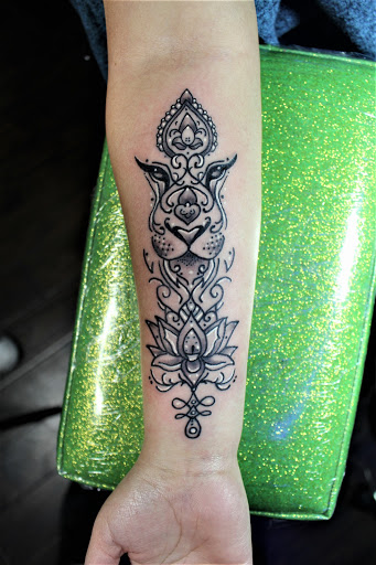 Explore swiss tattoo ideas, creative tattoo ideas in Arlington, available at The Chosen One Ink