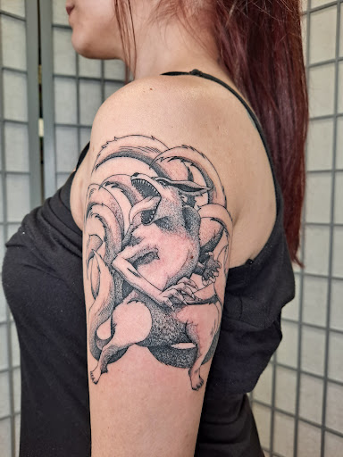 Explore behind the ear tattoo ideas for guys, creative tattoo ideas in Easton, available at Famous Tattoo Works