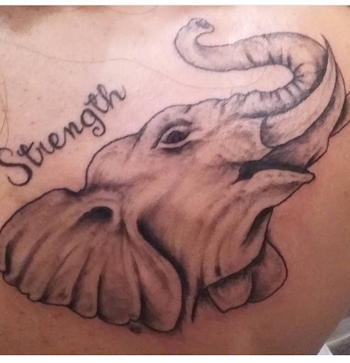 Explore elton john tattoo ideas, creative tattoo ideas in Southaven, available at Illusion Ink