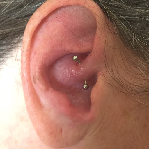 Explore chest and neck tattoo ideas, creative tattoo ideas in San Diego, available at Body Art Salon