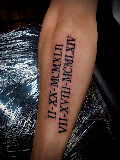 Explore under breast tattoo ideas for females, creative tattoo ideas in North Tonawanda, available at Dark Side Ink Tattoo Studio