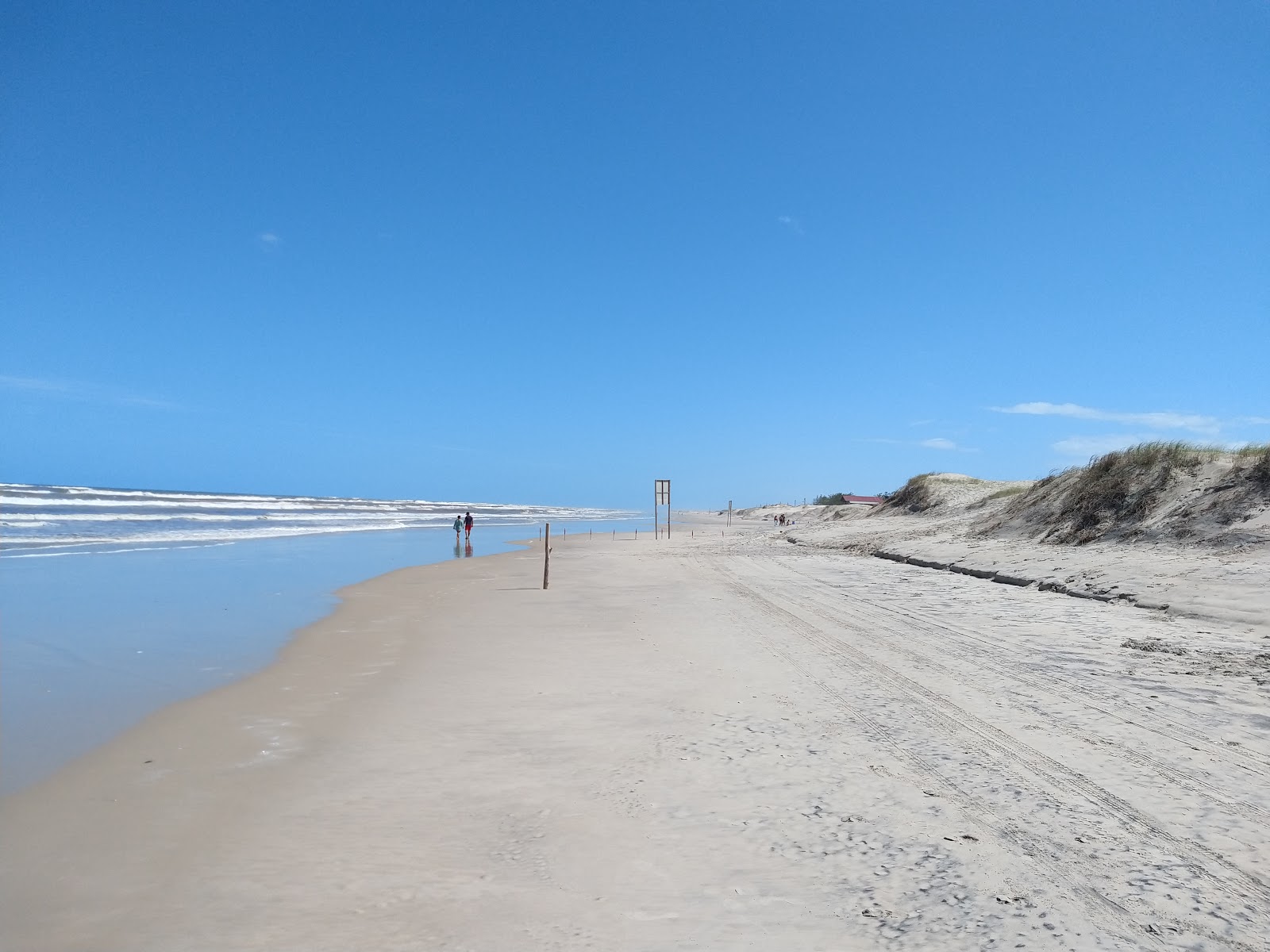 Photo of Mostardense Beach and the settlement