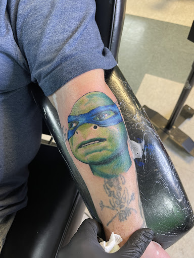 Explore cool thigh tattoo ideas, creative tattoo ideas in Waynesboro, available at Hessoms Ink