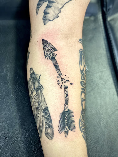 Explore undertaker tattoo ideas, creative tattoo ideas in Wilmington, available at Rogue Tattoo Studio