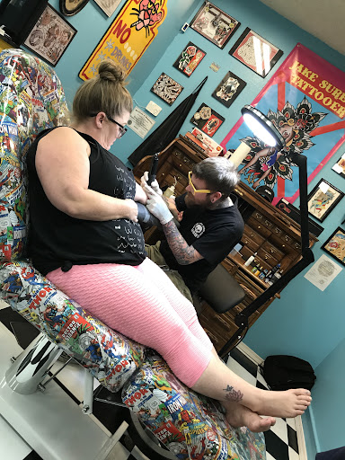 Explore unique hand tattoo ideas, creative tattoo ideas in Lake Isabella, available at Sacred heart tattoo