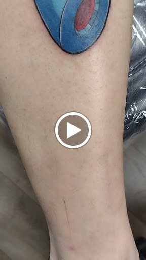 Explore mens armband tattoo ideas, creative tattoo ideas in Springfield, available at Red Tip Tattoos