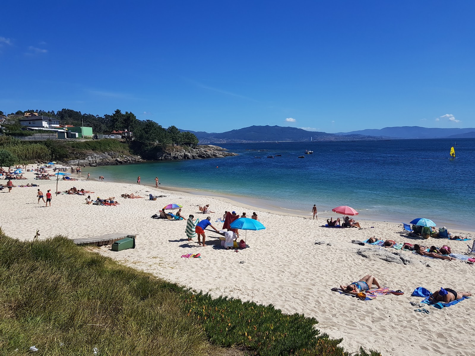 Photo of Praia de Limens with white fine sand surface