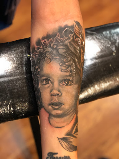 Explore tattoo ideas for neck, creative tattoo ideas in East Freedom, available at Midnight Ink Tattoo Parlor