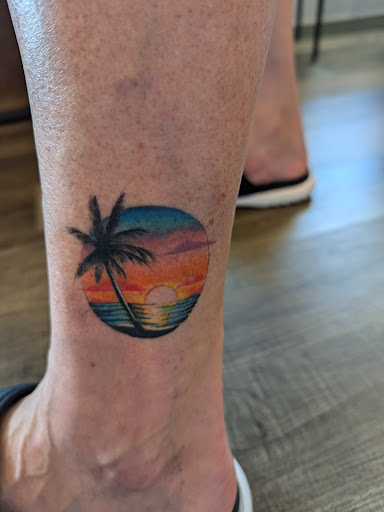 Explore dragon tattoo cover up ideas, creative tattoo ideas in Virginia Beach, available at The Collective Tattoo & Body Piercing