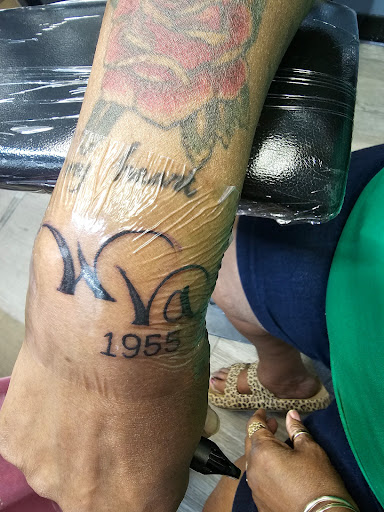 Explore ankle tattoo ideas for women, creative tattoo ideas in Charleston, available at Nemesis Tattoo and Art Gallery