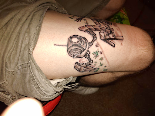 Explore wall-e tattoo ideas, creative tattoo ideas in Ogden, available at Legacy Tattoo