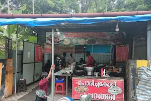 Keezhtholi Nadan Food image
