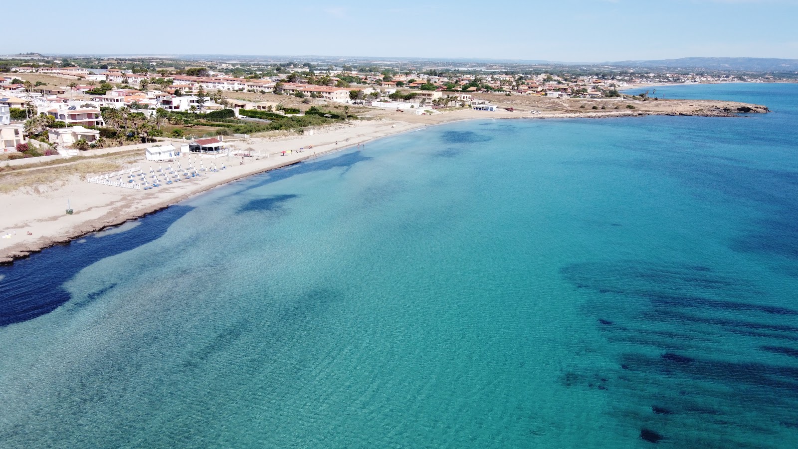 Foto di Spinazza Marzamemi con una superficie del acqua cristallina