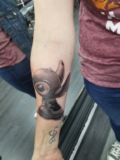 Explore breast cancer tattoo ideas, creative tattoo ideas in Hollywood, available at Sacred Eye Tattoos