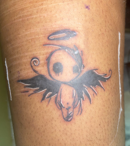 Explore ring tattoo cover up ideas, creative tattoo ideas in Cornelia, available at Prismatic Pulse Tattoo