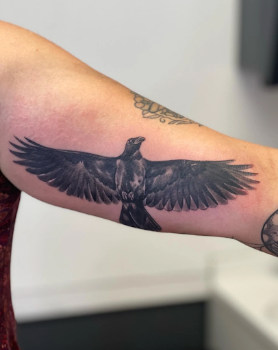 Explore ezra tattoo ideas, creative tattoo ideas in Milwaukee, available at The Skin Museum