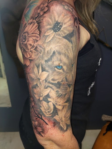 Explore mom son tattoo ideas, creative tattoo ideas in Odessa, available at Little Dragon Tattoos Studio