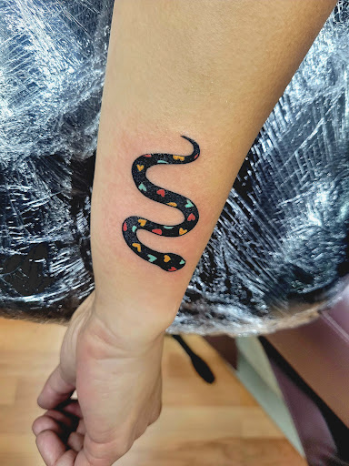 Explore colourful tattoo ideas, creative tattoo ideas in Benton, available at Spectrum Tattoo