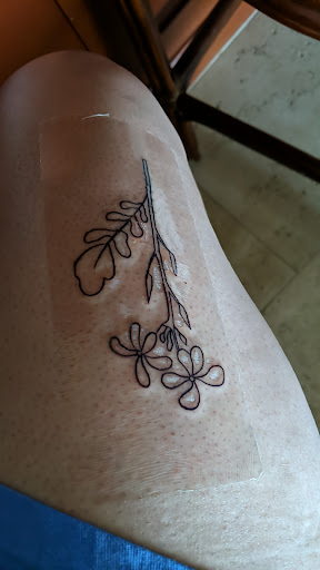 Explore tattoo ideas for men leg, creative tattoo ideas in Kailua Kona, available at Lady Luck Tattoo & Body Piercing