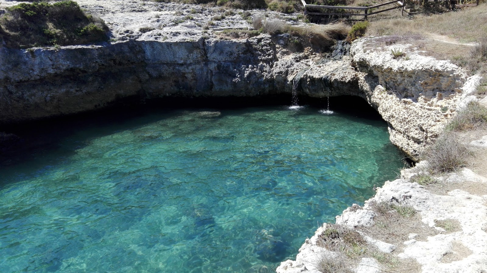 Fotografie cu Cala di San Pietro cu nivelul de curățenie înalt