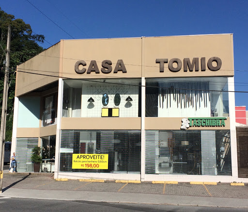Logo da empresa - Casa Tomio - Iluminação e Banheiro