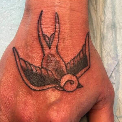 Explore traveling tattoos ideas, creative tattoo ideas in Marion, available at Kreaturs kave Tattoo studio