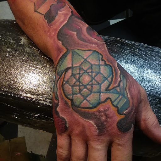 Tattoo Shop «Odd Fellows Tattoo», reviews and photos, 109 E Market St, Akron, OH 44308, USA