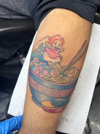Explore spartan helmet tattoo ideas, creative tattoo ideas in Tacoma, available at Garfield Street Tattoo Co