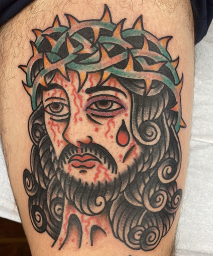 Explore tiger lily tattoo ideas, creative tattoo ideas in Johnson City, available at Gold Cross Tattoo Co.