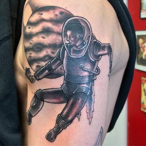 Explore tattoo ideas for men arm sleeve, creative tattoo ideas in Powell, available at Against All Odds Tattoos and Piercings