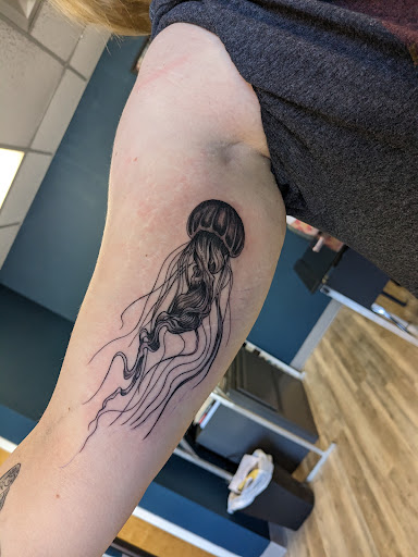 Explore globe tattoo ideas, creative tattoo ideas in East Rochester, available at Spice City Tattoo