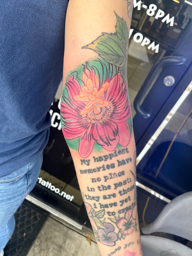 Explore dragonfly flower tattoo ideas, creative tattoo ideas in Augusta, available at Excalibur Art Collective