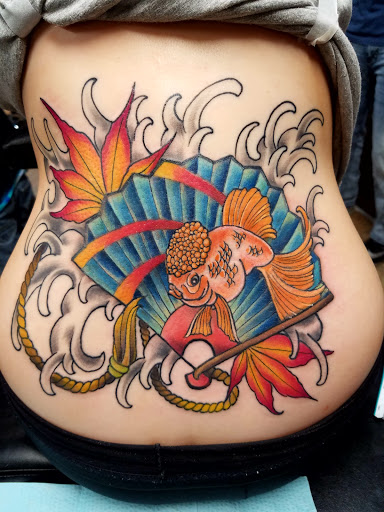 Explore tattoo ideas on thigh, creative tattoo ideas in Powell, available at Hummingbird Tattoo Studio