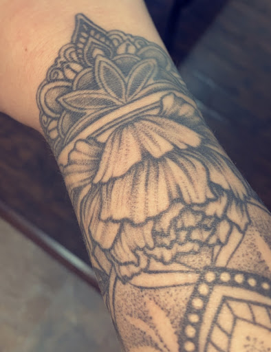 Explore badass tattoo ideas, creative tattoo ideas in Seymour, available at Sacred Art Tattoo