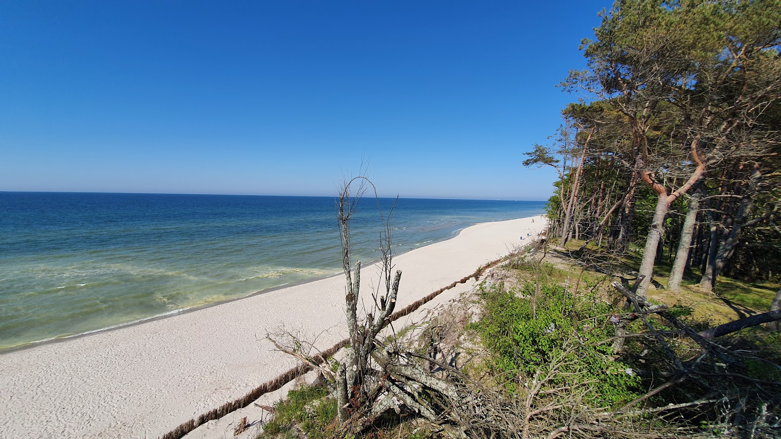 Foto van Karvenskiye pyatna met turquoise puur water oppervlakte