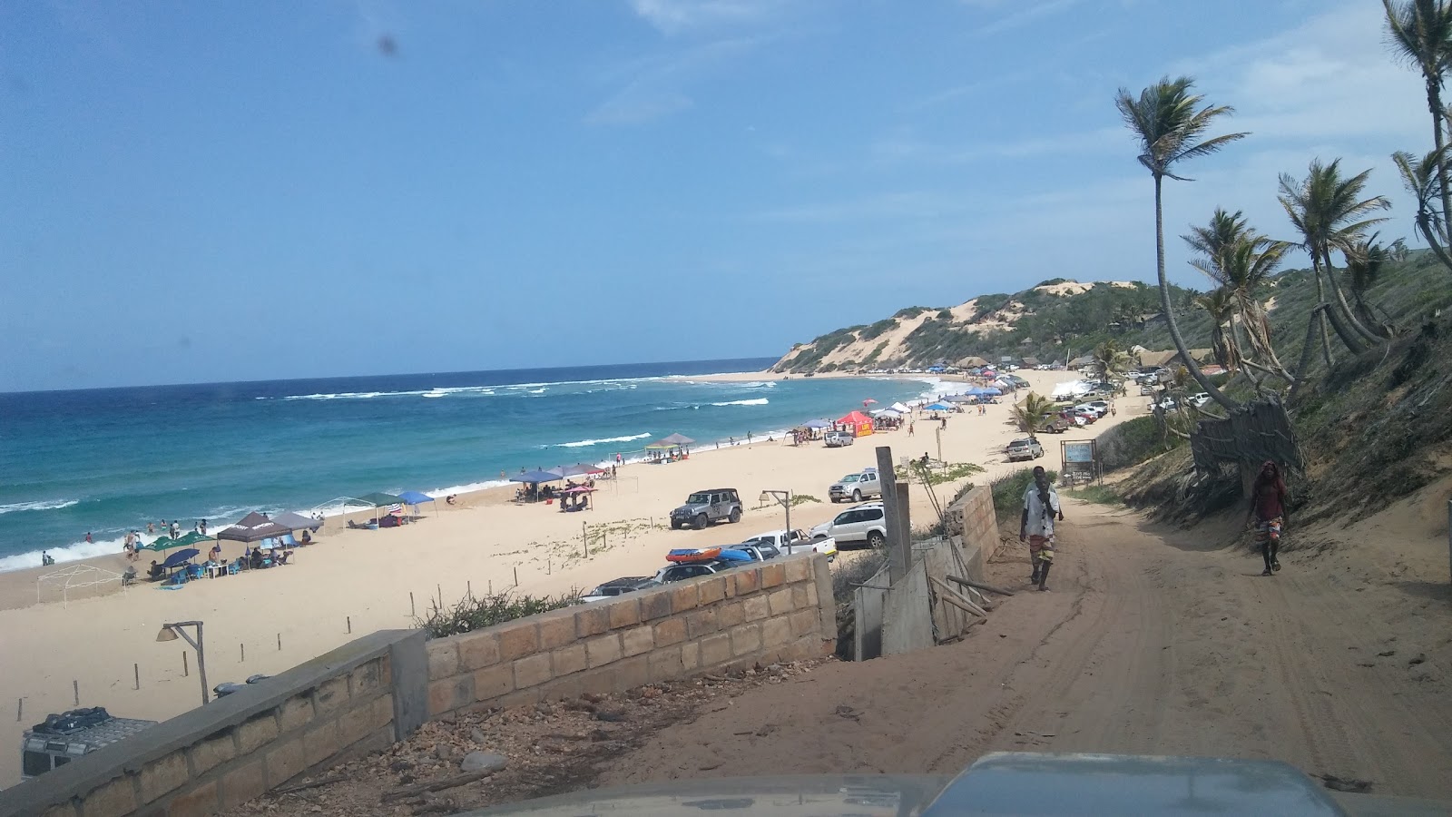 Praia de Jangamo'in fotoğrafı düz ve uzun ile birlikte