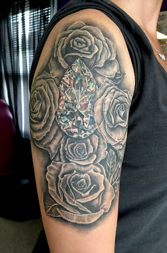 Explore lion and lamb tattoo ideas, creative tattoo ideas in Goshen, available at Lady Luck Studio