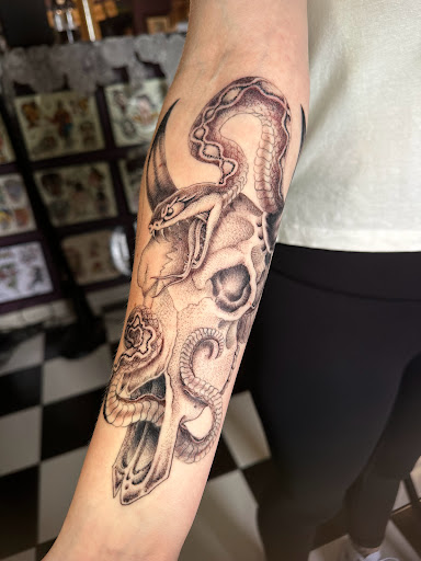 Explore tattoo arm filler ideas, creative tattoo ideas in Georgetown, available at Iron Rite Tattoo South