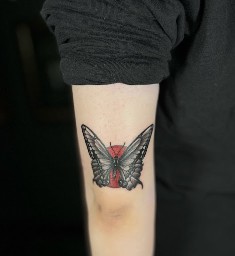 Explore female thigh tattoo ideas, creative tattoo ideas in Peoria, available at Modern Ink Tattoo