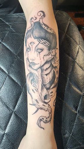 Explore tattoo ideas for family members, creative tattoo ideas in Minersville, available at Foundation Tattoo & Art Studio