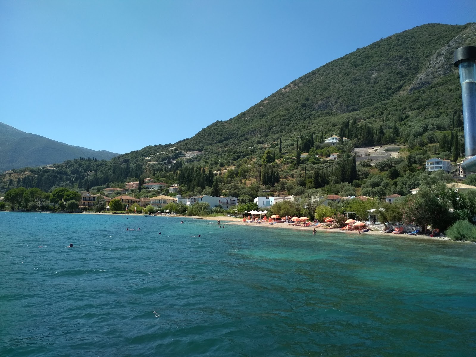Foto van Perigiali Strand II met turquoise puur water oppervlakte