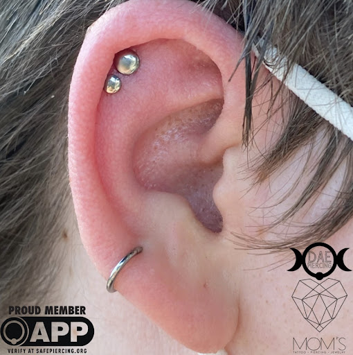 Find baby girl tattoo ideas for your next unique tattoo in Spokane at Moms Custom Tattoo & Body Piercing